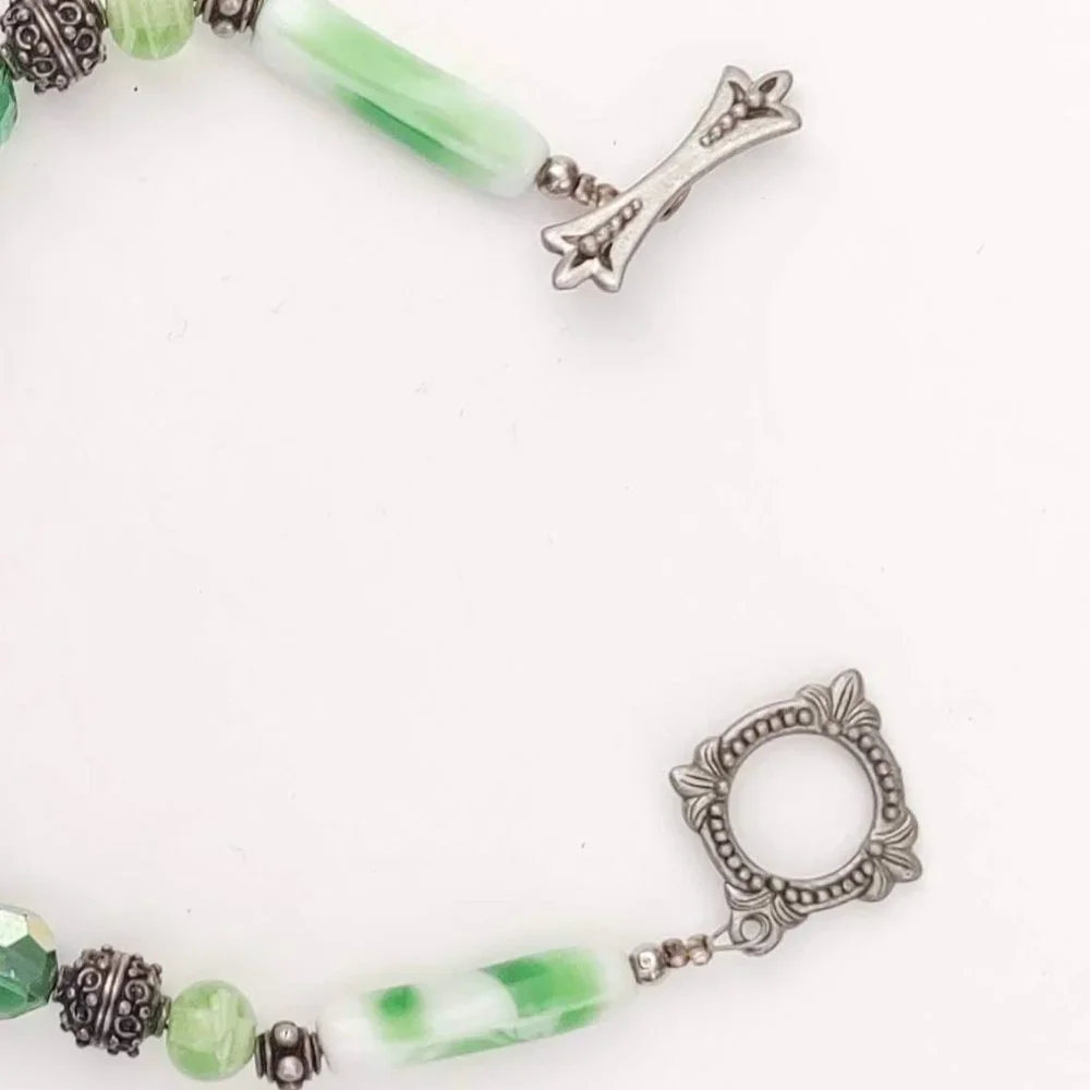 Green glass and antique silver beaded bracelet